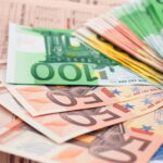euro notes on a financial newspaper